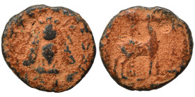 IONIA. Ephesos. Circa 2nd-1st centuries BC. Ae (bronze, 1.17 g, 11 mm), uncertain magistrate. Bee. Rev. Stag standing right; palm tree behind; monogra...