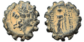 SELEUKID KINGS of SYRIA. Alexander II Zabinas, 128-122 BC. Ae serrate (bronze, 5.81 g, 18 mm), Apamea on the Orontes (?). Head of youthful Dionysos to...