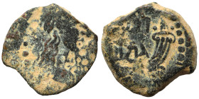 NABATAEA. 1st cent. AD. Ae (bronze, 2.50 g, 15 mm), Petra. Laureate bust right. Rev. Crossed cornucopias. Nearly very fine.