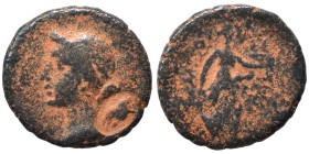 Greek. Ae (bronze, 3.12 g, 17 mm). Head of Apollo left. Rev. Nike (?) standing right. Fine.
