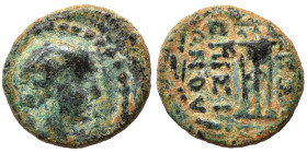 Greek. Ae (bronze, 2.30 g, 13 mm). Fine. Bust right. Rev. EMIΣI/ANOY (?) Tripod. Nearly very fine.
