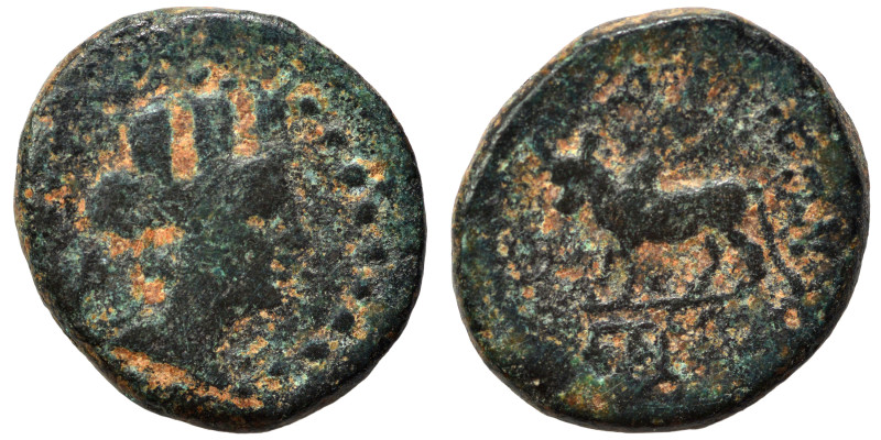 Greek. Ae (bronze, 3.23 g, 16 mm). Turreted head of Tyche right. Rev. Humped bul...