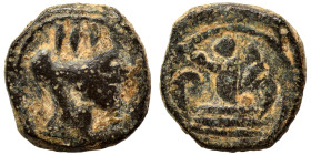 Greek. Ae (bronze, 0.98 g, 9 mm). Turreted head of Tyche right. Rev. Uncertain deity standing on galley, right. Nearly very fine.