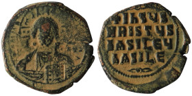 Basil II. and Constantine VIII. (1020-1028 AD). Follis. Constantinople. Obv: bust of Christ facing holding book. Rev: legend in four lines. artificial...