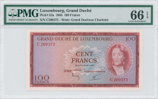 LUXEMBOURG: 100 Francs (18.9.1963) in dark red on multicolor unpt. Portrait of Grand Duchess Charlotte at right on face. S/N: "C 209373". WMK: Grand D...