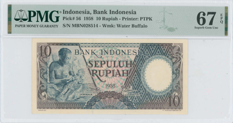 INDONESIA: 10 Rupiah (1958) in dark blue and multicolor. Carvet at left on face....