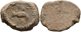 Lead Tessera
(47.63g 34.3mm diameter)
Obv: Eagle flying (?)
Rev: Blank