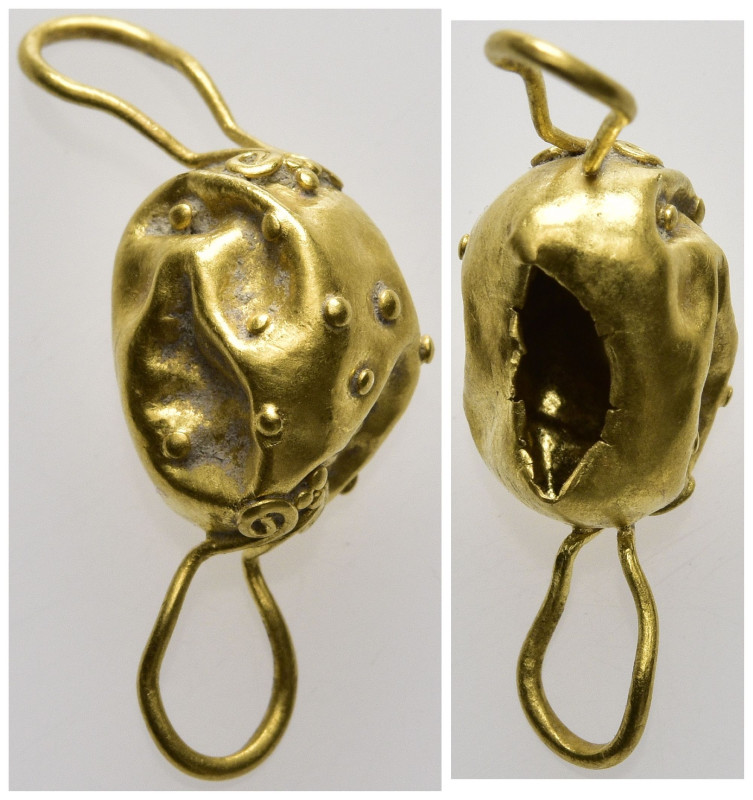 Ancient gold object
(0.97g 23mm diameter)