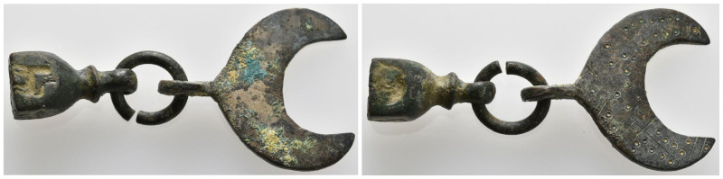 Ancient object
(8.9g 48mm diameter)