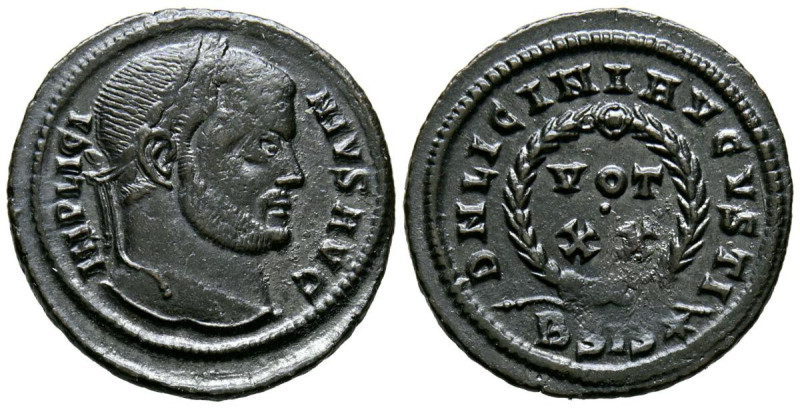 LICINIO I. Follis. (Ae. 2,68g/20mm). 320-321 d.C. Siscia. (RIC 160). Anv: Cabeza...