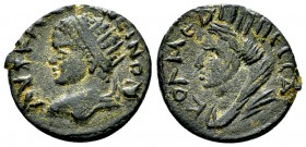 Elagabalus AE18, Edessa 

Elagabalus (218-222 AD). AE18 (2.79 g), Mesopotamia, Edessa.
Obv. AYT K [...] ANTWNEINOC, Radiate head to left.
Rev. KOΛ...