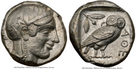 ATTICA. Athens. Ca. 455-440 BC. AR tetradrachm (23mm, 17.17 gm, 4h). NGC Choice XF 5/5 - 4/5. Early transitional issue. Head of Athena right, wearing ...