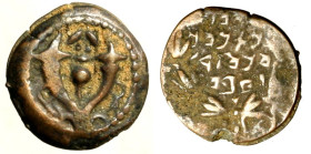 JUDAEA. Alessandro Jannaeus (104-76 a.C.) Prutah per Gerusalemme. Scritta in corona R/ Doppia cornucopia e melagran. Hendin 478 AE RARO (g. 1,05) +BB