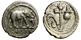 GIULIO CESARE. (49-44 a. C.) Denario. Elefante verso ds. calpesta dragone R/ Strumenti sacerdotali (g. 3,32 mm. 18) Crawford 443/1. raro qSPL