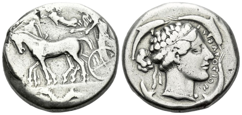 Sicily, Syracuse Tetradrachm circa 440-430, AR 26.00 mm., 16.93 g.
Slow quadrig...