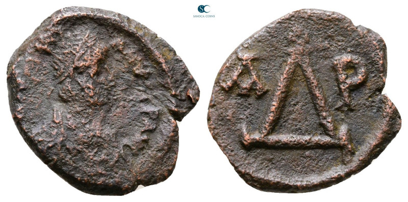 Justinian I AD 527-565. Thessalonica
4 Nummi Æ

17 mm, 1,97 g



Good Fin...