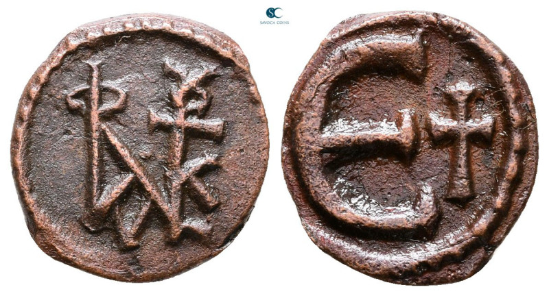 Justin II AD 565-578. Theoupolis (Antioch)
Pentanummium Æ

15 mm, 1,20 g

...