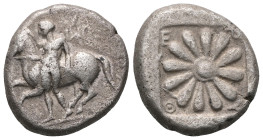 Ionia, Erythrai AR Drachm. 480-450 BC. Nude youth running beside his horse galloping left, holding the horse's reins in his right hand, [wasp flying a...