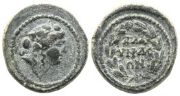 Greek
Phrygia, Ancyra AE (Bronze) 165-129 BC
Obv: Zeus head r. with laurel wreath
Rev: Thunderbolt withuin wreath
Ref: Hoover 749; SNG Cop. 1 ff.