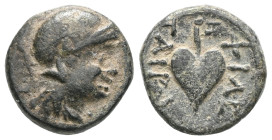 GREEK
Mysia. Kings of Pergamon. Philetairos 282-263 BC. Bronze AE.  Helmeted head of Athena right. Rev: ΦIΛE/TAIPOY/ Ivy leaf.