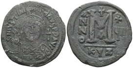 JUSTINIAN I (527-565). Follis. Kyzikos.
Obv: D N IVSTINIANVS P P AVG.
Helmeted, draped and cuirassed bust facing, holding globus cruciger and shield; ...