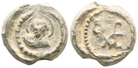 Byzantine Lead Seal (7th century)  Obverse: Bust of Virgin Mary from the front. He holds the child Jesus in a medallion on his chest. Halo Wreath bord...