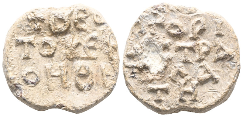 Byzantine Lead Seal: Strateletes (6th century)
Obverse: Three lines of text sta...