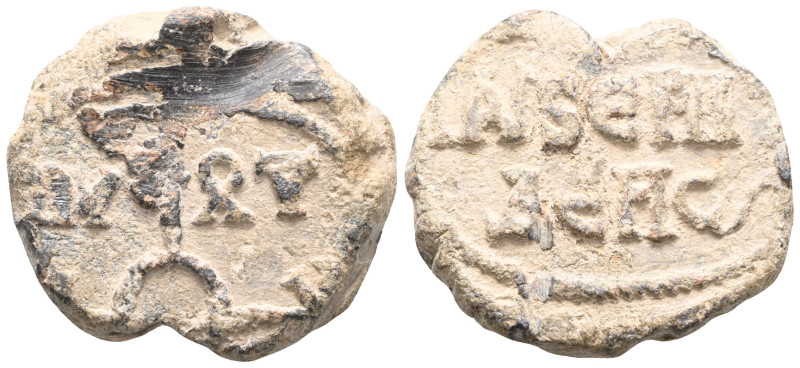 Byzantine Lead Seal (6th century)
Obverse: Two lines of text. There is a scratc...