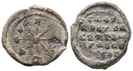 Byzantine Lead Seal: (7th-8th century)
Obverse: 9-armed banner. Inscription on starboard ends. Wreath border.

Reverse: Five lines of text. Wreath ...