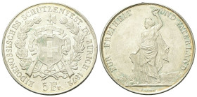 SVIZZERA
Tiri federali.
5 Franchi 1872 Zurigo.
Ag
gr. 25,02
Dr. Scudo elvetico sovrapposto a fucili e pileo con falcetto, entro due rami di edera...