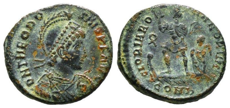 THEODOSIUS I (379-395). Ae.
Obv: D N THEODOSIVS P F AVG.
Helmeted, diademed, d...