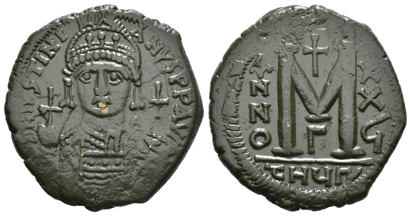 JUSTINIAN I (527-565). Follis.
Obv: D N IVSTINIANVS P P AVG.
Helmeted and cuir...