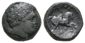 KINGS OF MACEDON. Philip II (359-336 BC). Ae Unit. Uncertain mint in Macedon.
Obv: Diademed head of Apollo right.
Rev:Naked youth on horse right, we...