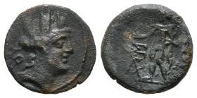 CILICIA. Korykos. Ae (1st century BC).
Obv: Turreted head of Tyche right; 
Rev: KΩPVKIΩΤΩΝ / EP / ΠO / EΡ.
Hermes standing left, holding purse and ...