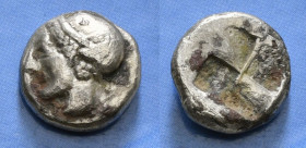 IONIA. Phokaia. Diobol (Circa 521-478 BC).
Obv: Archaic female head left, wearing earring and helmet or close fitting cap.
Rev: Quadripartite incuse...