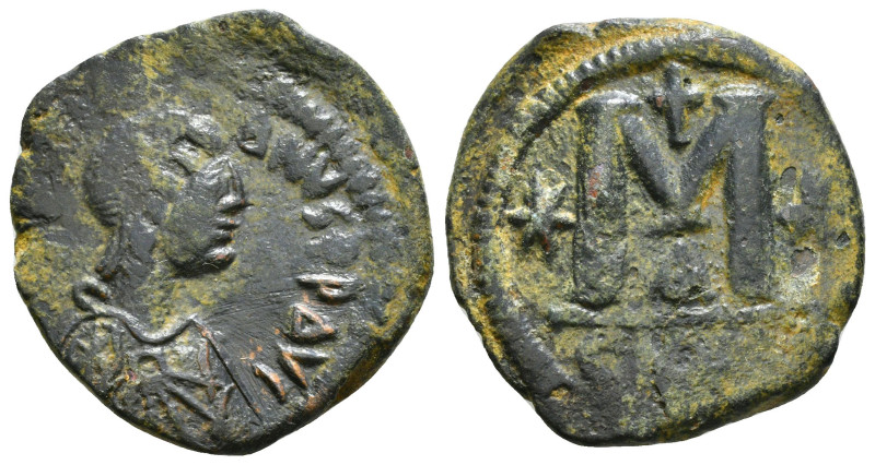 JUSTINIAN I (527-565). Follis. Constantinople.
Obv: D N IVSTINIANVS P P AVG.
D...