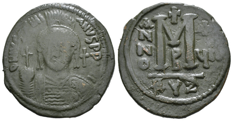 JUSTINIAN I (527-565). Follis.
Obv: D N IVSTINIANVS P P AVG.
Helmeted and cuir...