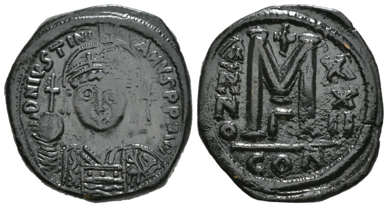 JUSTINIAN I (527-565). Follis.
Obv: D N IVSTINIANVS P P AVG.
Helmeted and cuir...