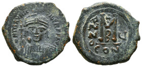 MAURICE TIBERIUS (582-602). Follis. Constantinople. Dated RY 7 (588/9).
Obv: D N MAVRIC TIЬЄR P P AVG.
Helmeted and cuirassed bust facing, holding g...