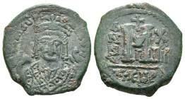 MAURICE TIBERIUS (582-602). Follis. Theoupolis (Antioch). Dated RY 5.
Obv: Crowned bust facing, wearing consular robes and holding mappa and eagle-ti...