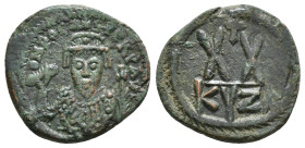 Phocas (602-610 AD). Kyzikos. AE Half Follis 
Obv: D N FOCAS PER P AVG. Crowned bust of Phocas facing, wearing consular robes, holding mappa in his r...