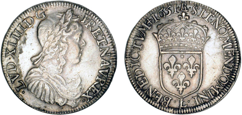 LOUIS XIV le Grand (1643-1715)
1/2 écu blanc à la mèche longue
1651 L - TTB 45...