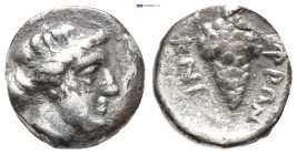 CARIA, Myndos. Mid 2nd century BC. AR Trihemiobol (9mm, 0.87 g). Head of young Dionysos right / Grape bunch.