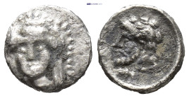 Cilicia, Uncertain mint. AR Hemiobol, (7mm, 0.29 g). 4th century BC. Obv: Veiled and draped bust of female facing slightly to left, wearing earrings a...