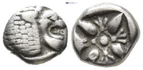 IONIA, Miletos. ca. 500 BC. AR Diobol (8mm, 1.1 g) Forepart of lion Rev.Starlike floral ornament in shallow incuse square.