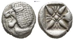 IONIA, Miletos. ca. 500 BC. AR Diobol (9mm, 1.0 g) Forepart of lion to right, his head turned back to left. Rev.Starlike floral ornament in shallow in...