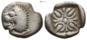 IONIA. Miletus. Ca. 540-480 BC. AR diobol (9mm, 0.93 g) Forepart of lion to right, his head turned back to left. Rev.Starlike floral ornament in shall...