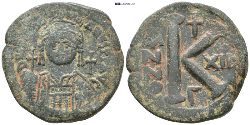 Justinian I Æ 20 Nummi. (28mm, 9.89 g) Constantinople, Dated RY 12 = AD 538-539....