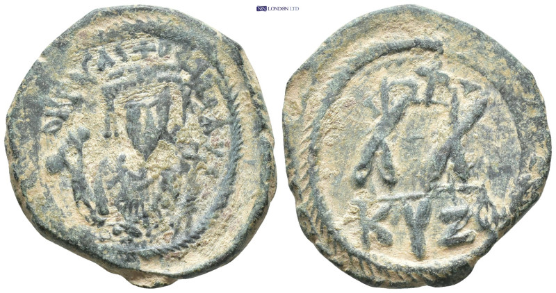 Phocas. AD 602-610. Cyzicus Half follis Æ (22mm., 6.14 g). Crowned facing bust, ...