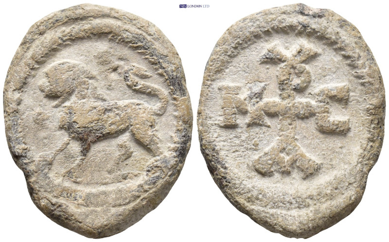 Byzantine Lead Seal. (22mm, 9.7 g) Obv: Lion advancing left. Rev: Monogram.